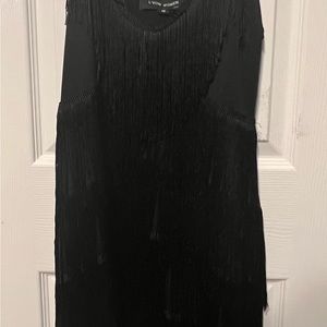 Super cute fringed adjustable strap black dress. Size “M”